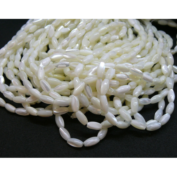 Perles Oblong, Nacre forme grain de riz  4 par 7 mm, coloris Blanc Irisé