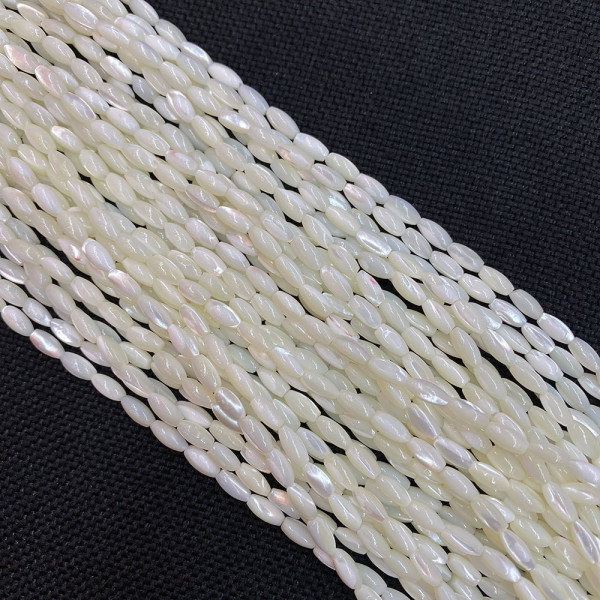 Perles Oblong, Nacre forme grain de riz  4 par 7 mm, coloris Blanc Irisé