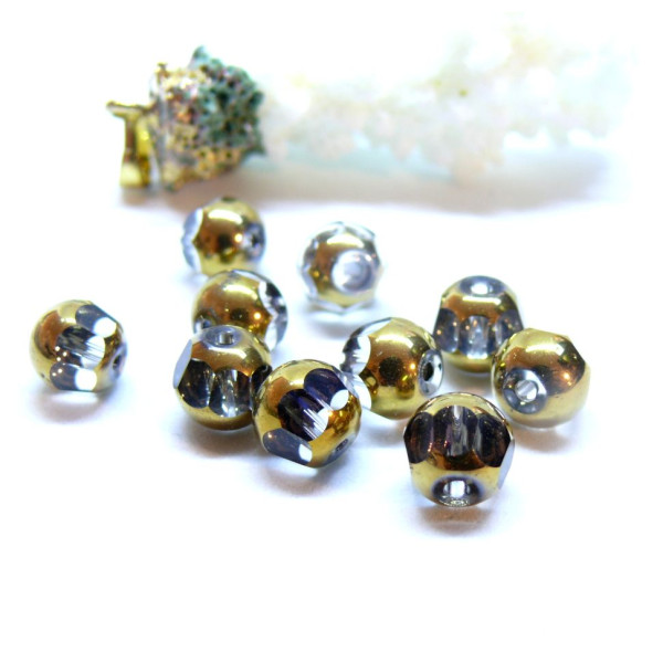 Perles en verre facettés  avec dorure 7 par 8mm