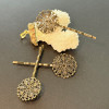 Lot de 4 Barrettes Fleur Plates Bronze – 55mm