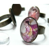 4pieces: 2 bagues bronze qte 13 par18 et 2 cabochons en verre