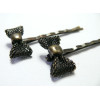 1 magnifique barrette noeud bronze