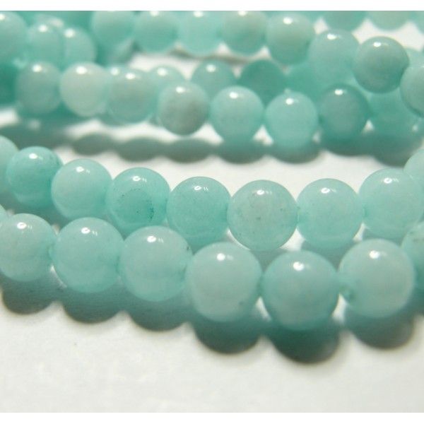 1 fil de perles  jade teintée couleur bleu pale 4mm environ 97 perles