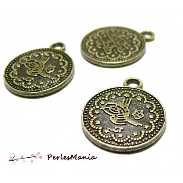 10 pendentifs ref 2Y8116 medaillon oiseau metal couleur Bronze