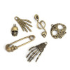 S11201261 Set de 6 pieces pendentifs breloque tête de mort, crane, squelette, halloween metal couleur BRONZE