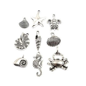 S11207652  PAX 9 pendentifs thème Océan,Coquillage, etoile, crabe métal couleur Argent Antique