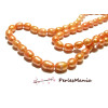 Perles d'eau douce teintées ORANGE SAUMON forme de GRAIN DE RIZ ovale 5 par 7mm