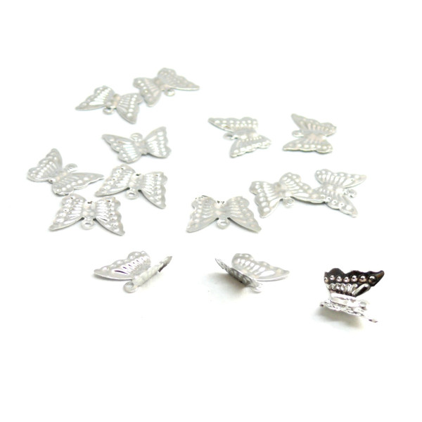Lot de 100 breloques estampes Papillon métal coloris Argent Platine ref 1