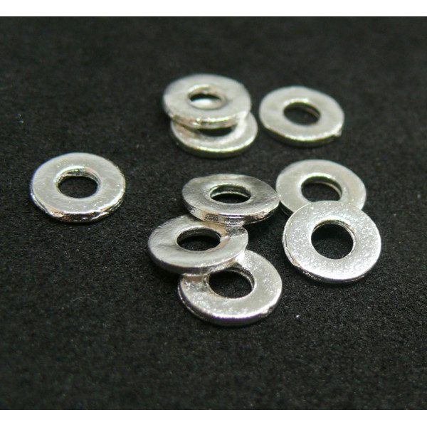 Perles intercalaires Rondelles 7 par 1mm métal couleur Argent Vif