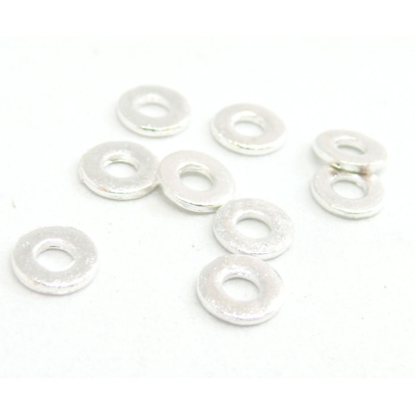 Perles intercalaires Rondelles 7 par 1mm métal couleur Argent Vif