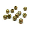 perles intercalaires forme Rondes Ethnique 7 mm métal coloris BRONZE