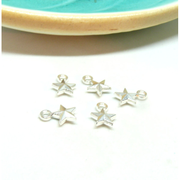 Pendentifs, breloques étoiles 3D 11 par 8mm métal finition Argent Vif