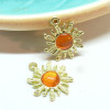 Pendentifs Soleil Œil de Chat Orange  21.5 mm métal finition Doré