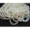 Perles nacre Oblong forme grain de riz  5 par 9 mm coloris Blanc Irisé