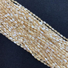 Perles nacre Oblong forme grain de riz  4 par 7 mm coloris Beige Crème