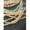 Perles nacre Oblong forme grain de riz  4 par 7 mm coloris Beige Crème