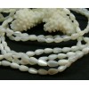 Perles nacre forme Goutte 7 par 5mm coloris Blanc