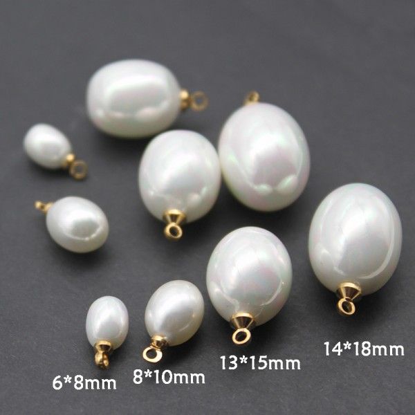 Pendentifs perles nacre forme Ovale 6 par 8mm coloris Blanc