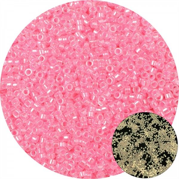 Sachet d'environ 700 Perles de rocaille en verre phosphorescent qui s'illumine dans la nuit 2.5mm Rose 10gr