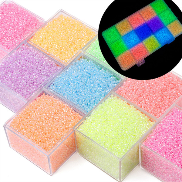 Sachet d'environ 700 Perles de rocaille en verre phosphorescent qui s'illumine dans la nuit 2.5mm Rose pale 10gr