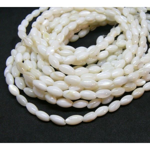 Perles nacre forme Grain de Riz 7 par 4 mm coloris Blanc crème