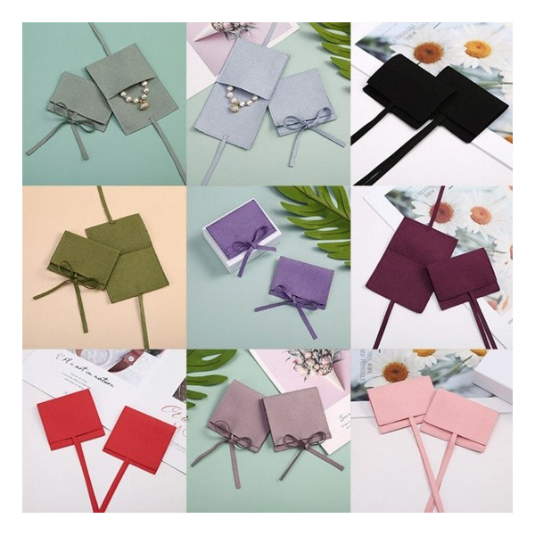 Pochette pochon sachet cadeaux 6 par 8 cm effet suédine coloris Noir se ferme avec Nœud